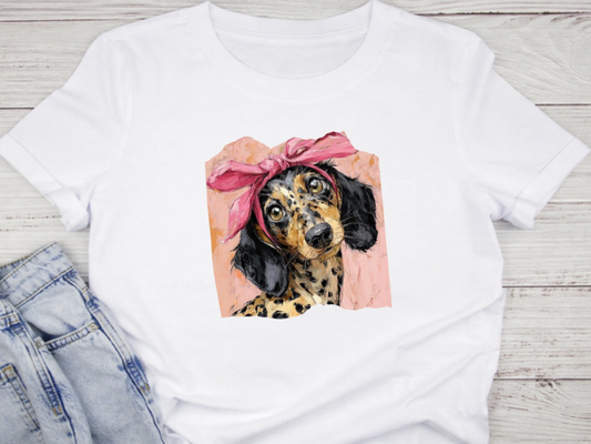 Petit chien au foulard rose 🐶💖